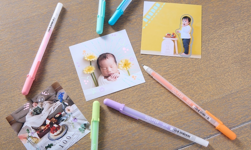写真に書けるペン_子どもの写真をペンで彩る