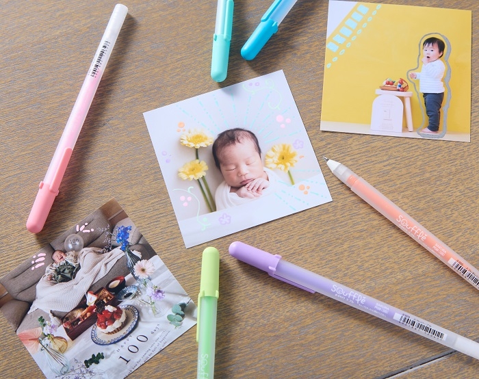 子どもの写真をペンで彩る